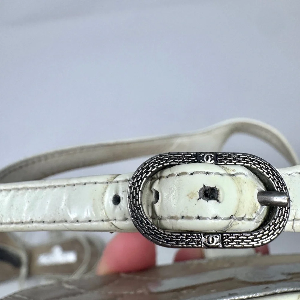 CHANEL White Leather Thong Sandals with Stacked Silver Coin Medallions